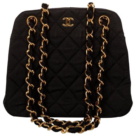 chanel purse black gold chain|Chanel clutch with chain black.